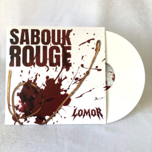 The front cover of the vinyl of the album "Sabouk Rouge" with a big blood stain in the bottom left under a whip. The title is written in big font at the upper left and the logo of Lomor is placed in the bottom right. The vinyl record can be seen protruding from its sleeve.